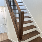 Industrial-style modern stairs with steel railings