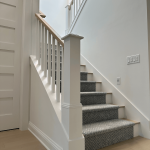 Minimalist wooden staircase in a modern home