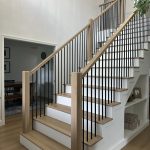 A beautifully crafted craftsman staircase featuring rich wood tones and classic details.