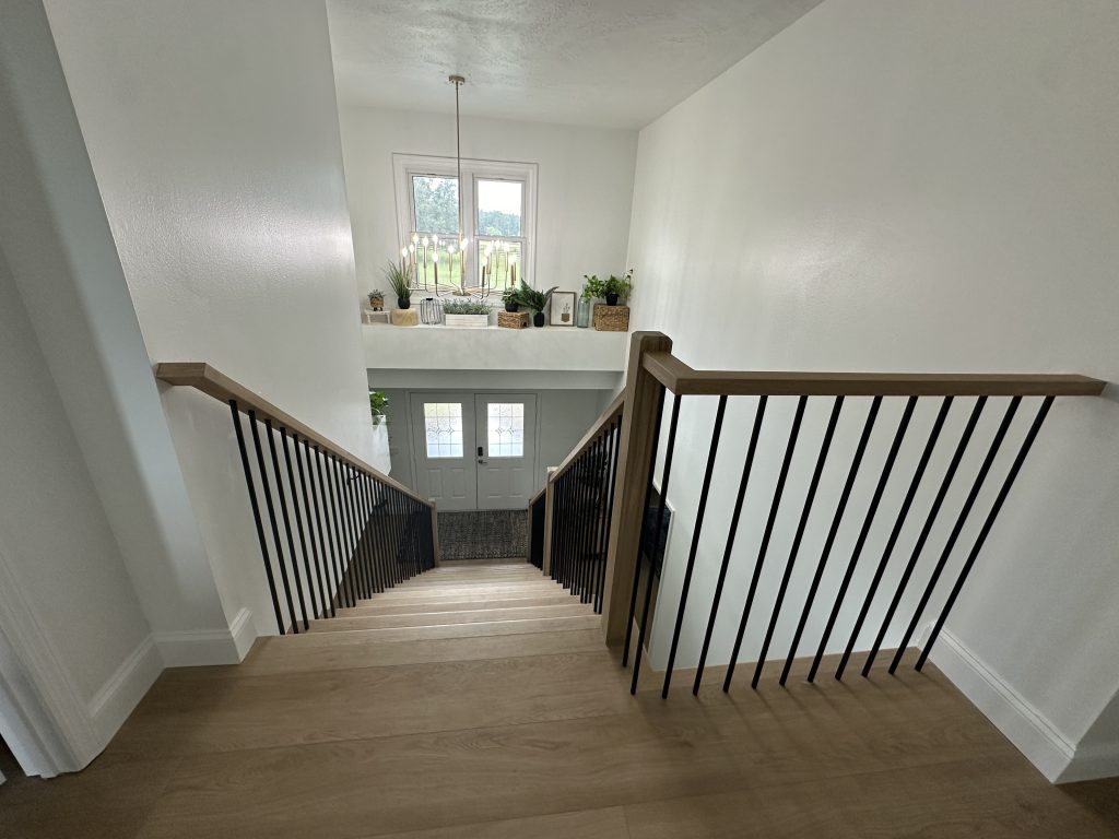 A beautifully crafted craftsman staircase featuring rich wood tones and classic details.
