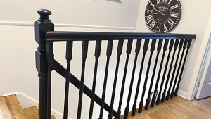 Staircase with a black painted handrail for a clean finish.